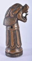 A 19TH CENTURY TIBETAN BRONZE BUDDHISTIC BEAST SEAL with removable base. 8 cm high.