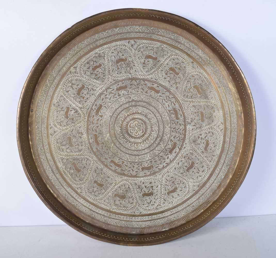 A large Central Asian embossed brass tray 48cm diameter - Image 2 of 6