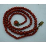 AN ANTIQUE CORAL NECKLACE. 17.7 grams. 48 cm long.