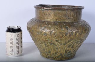 A 18/19th Century Central Asian Repousse brass jardiniere decorated with animals and calligraphy