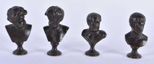 A SET OF FOUR 19TH CENTURY EUROPEAN GRAND TOUR BRONZE BUSTS of small form. 5.5 cm high. (4)