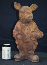 A cast Iron Beatrix potter pig figure 43 cm.