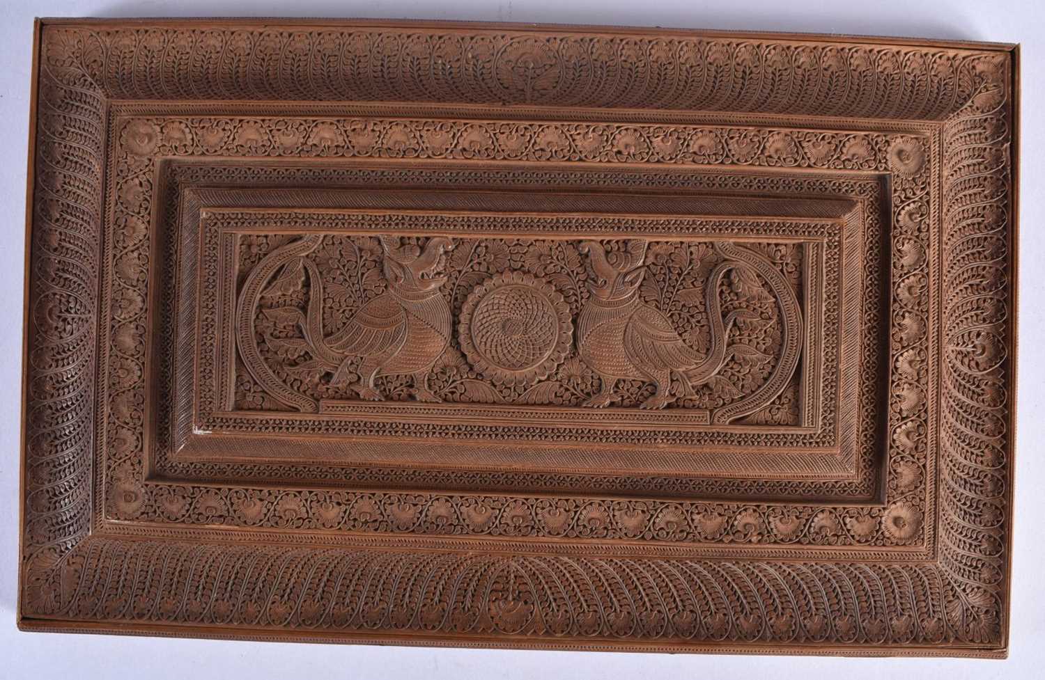 A FINE MID 19TH CENTURY ANGLO INDIAN CARVED WOOD CASKET AND COVER decorated with mythical birds, - Image 7 of 12