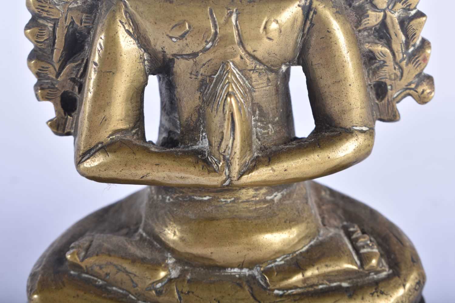 A 17TH/18TH CENTURY INDIAN BRONZE FIGURE OF A SEATED MALE DEITY modelled with hands clasped. 12 cm x - Image 3 of 7
