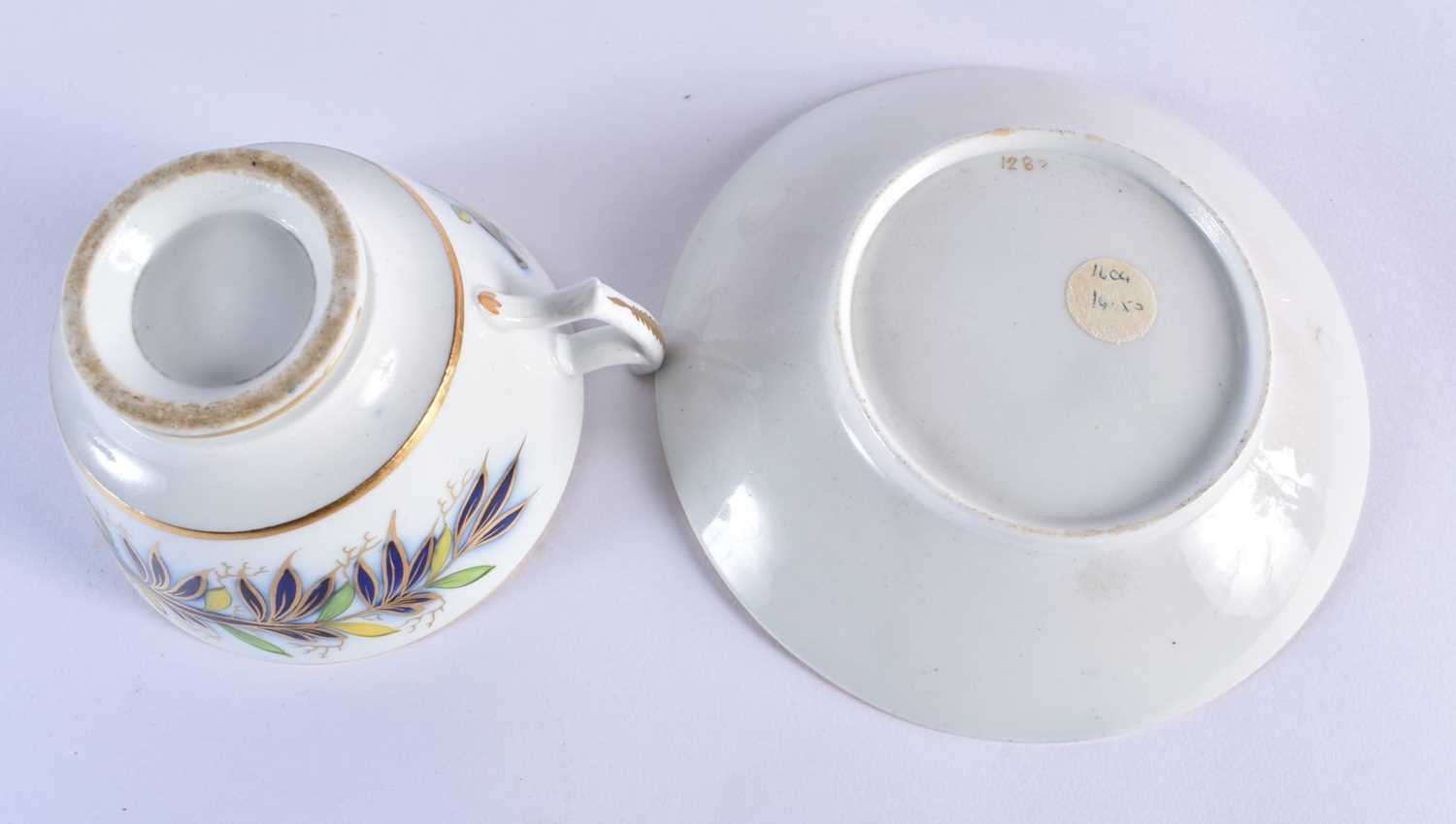 English fine cup and saucer, with coffee cup painted with large specimen flowers under a lime - Image 3 of 8