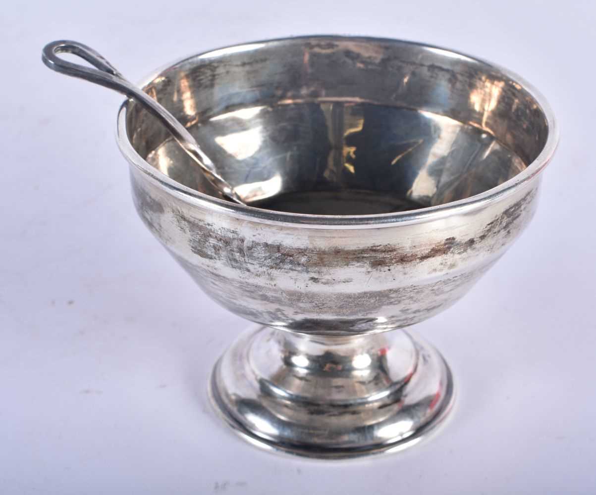 A Silver Sauce Bowl and Ladle by Arnold E Williams Hallmarked Birmingham 1944. Bowl 9.5 cm x 7cm,