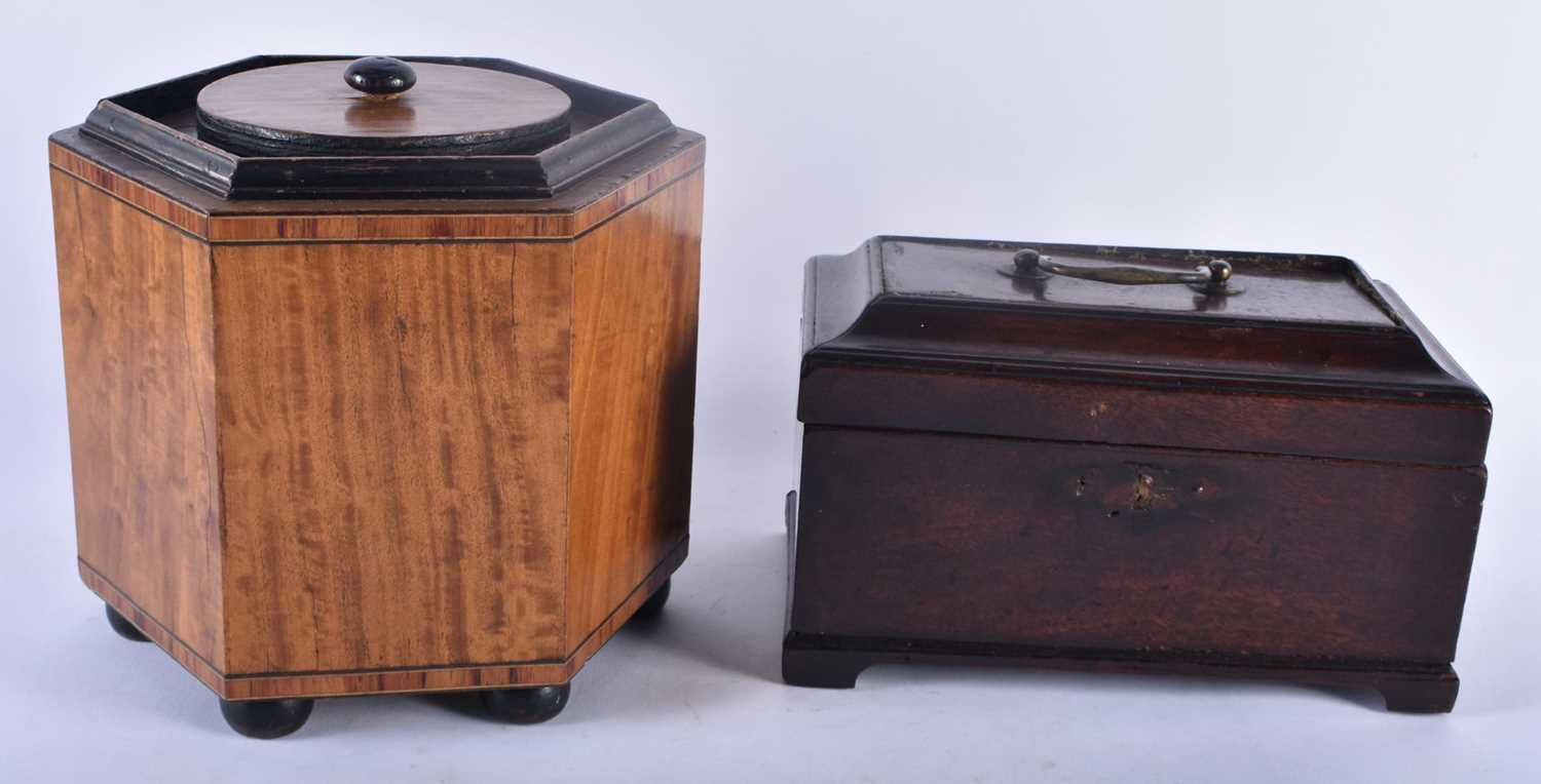 A GEORGE III MAHOGANY TEA CADDY together with a large satinwood biscuit barrel and cover. Largest 20
