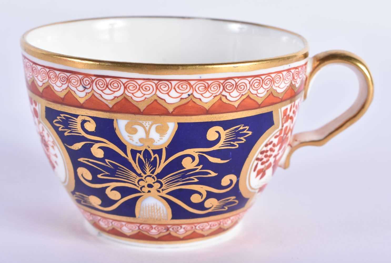 Spode teacup and saucer painted with the “Dollar” pattern and a saucer dish in the same pattern - Image 7 of 9