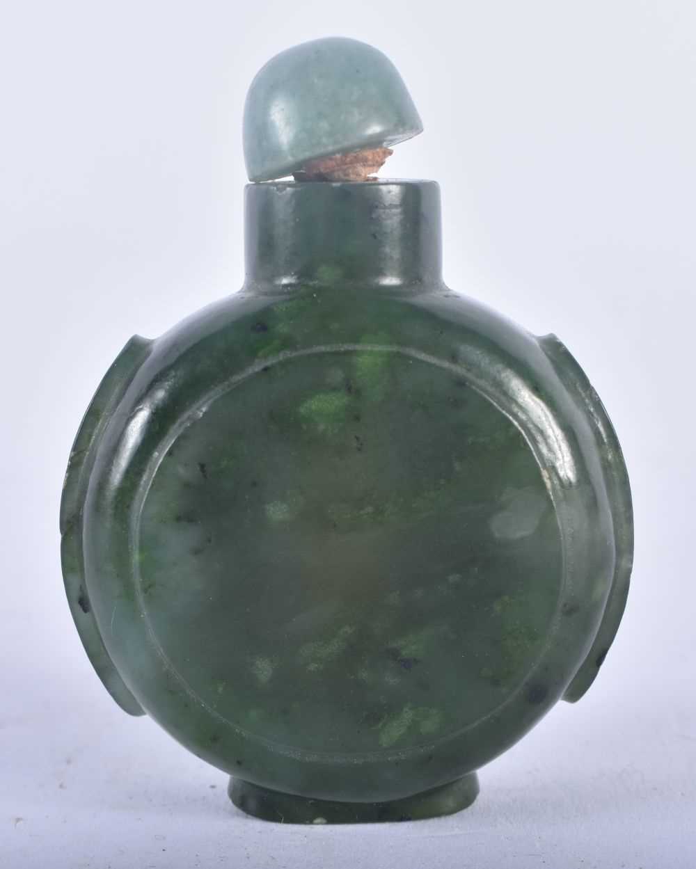 A 19TH CENTURY CHINESE CARVED SPINACH JADE SNUFF BOTTLE AND STOPPER Qing. 6 cm x 4.25cm.