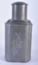 AN EARLY 20TH CENTURY CHINESE PEWTER TEA CANISTER AND COVER decorated with foliage. 16 cm high.