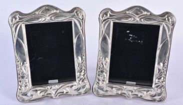 A Pair of Silver Photo Frames. Hallmarked London 2022 and 2023. 20 cm x 16cm (2)