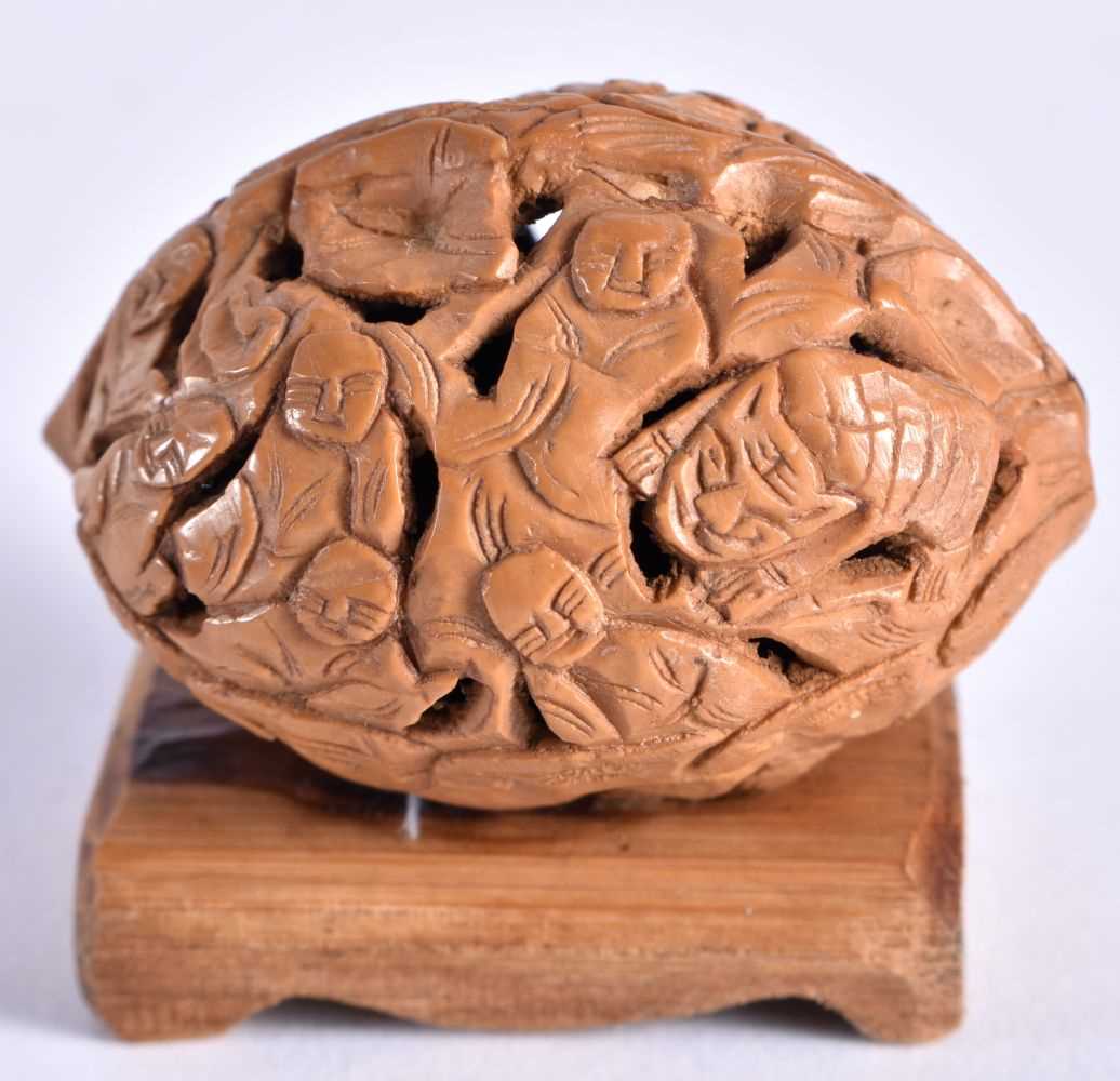 A COLLECTION OF 19TH/20TH CENTURY CHINESE CARVED NUTS Late Qing, in various forms and sizes. 5 cm - Image 7 of 7