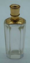 A 14CT GOLD AND GLASS SCENT BOTTLE. 71 grams. 8.75 cm x 2.75 cm.