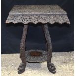 A 19th Century Anglo Indian/Burmese carved hardwood two tiered table 54 x 34 x 45cm