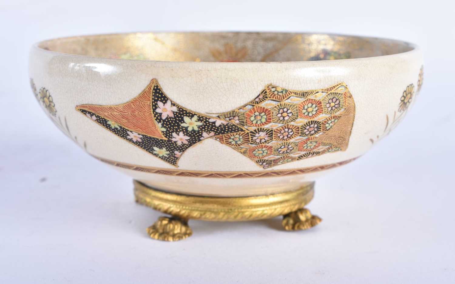 A LATE 19TH CENTURY JAPANESE MEIJI PERIOD SATSUMA BOWL painted with geisha. 12 cm diameter.