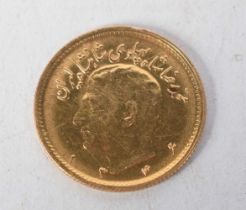 `1/4 Pahlavi Mohammad Reza Shah Gold Coin 1335 (1956).  1.9cm diameter, weight 4g
