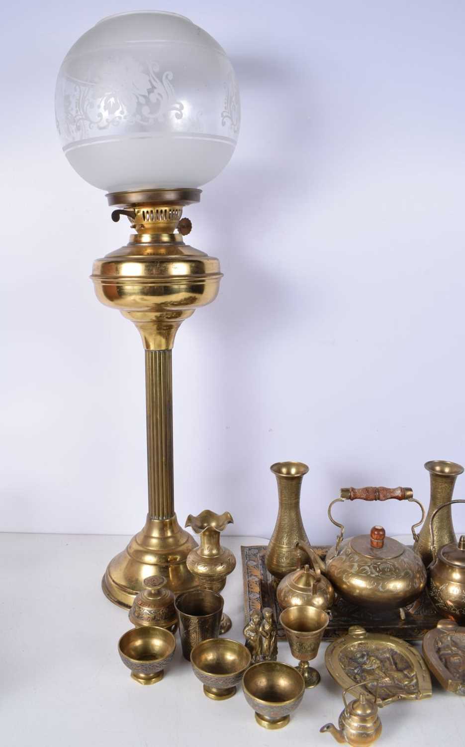A collection of Central Asian brass items , together with a brass oil lamp with an etched glass - Image 3 of 8