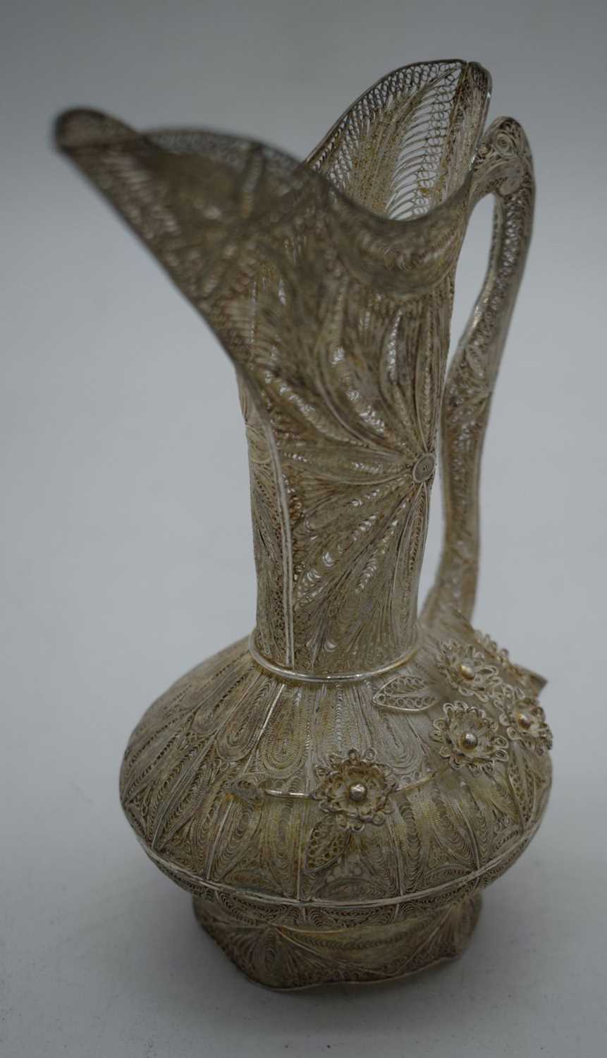 AN UNUSUAL CONTINENTAL SILVER FILIGREE BIRD AND FLOWER JUG. 171 grams. 17 cm x 14 cm. - Image 3 of 4