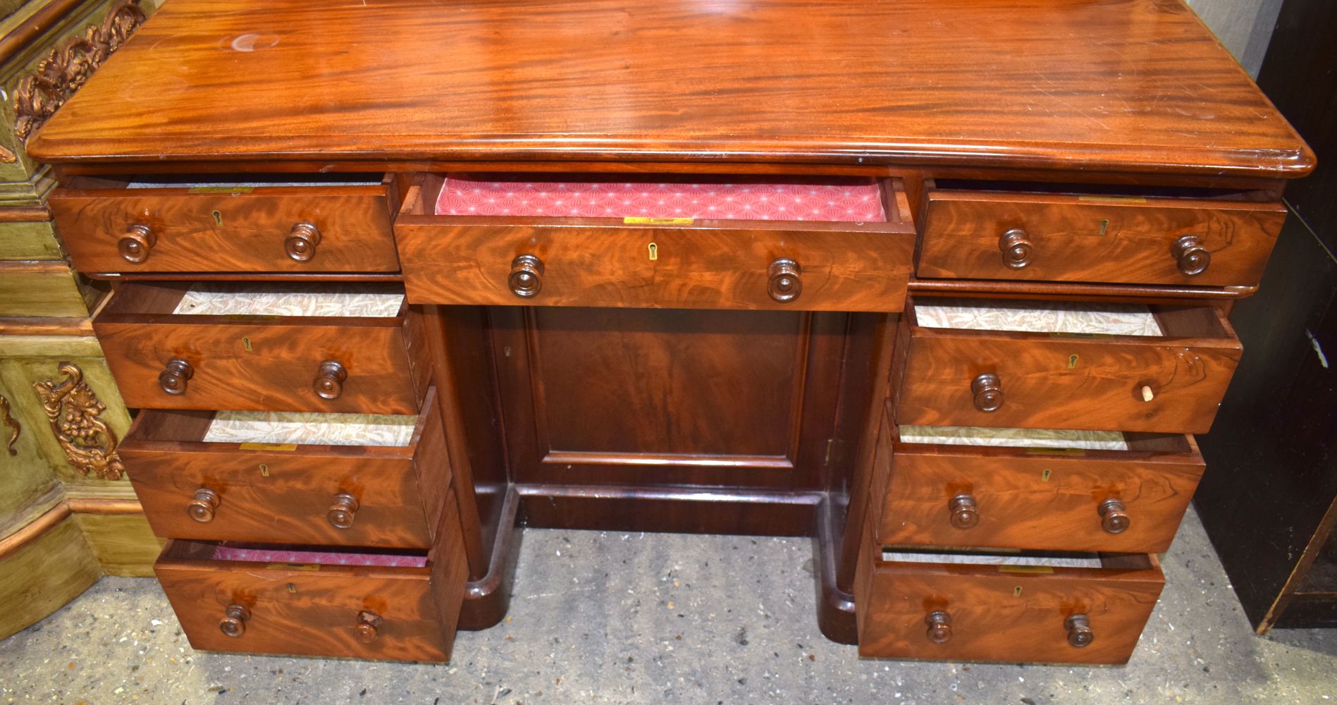 A Victorian flame mahogany 9 draw pedestal desk 90 x 136 x 61 cm. - Image 8 of 12