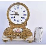 A 19TH CENTURY FRENCH ORMOLU AND SEVRES PORCELAIN MANTEL CLOCK supported upon a white marble base.