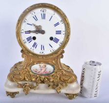 A 19TH CENTURY FRENCH ORMOLU AND SEVRES PORCELAIN MANTEL CLOCK supported upon a white marble base.