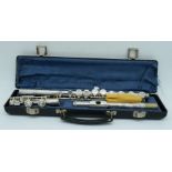 A cased Rosehill flute 66 cm