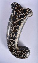 AN ISLAMIC MIDDLE EASTERN CARVED JADE DAGGER HANDLE decorated all over with calligraphy. 13 cm x 6