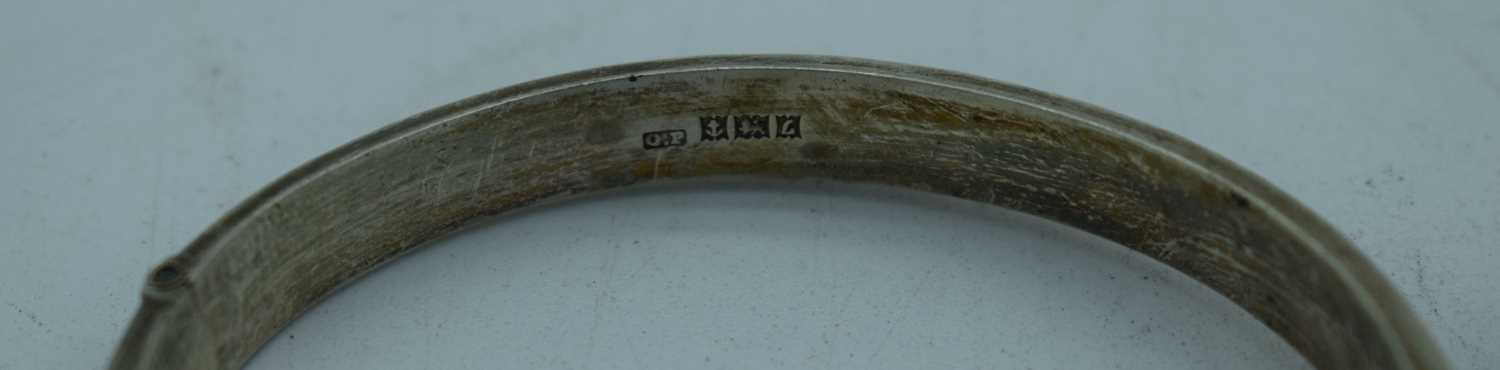 TWO SILVER BANGLES. Chester 1955 & Birmingham 1960. 33 grams. Largest 6 cm wide. (2) - Image 3 of 3