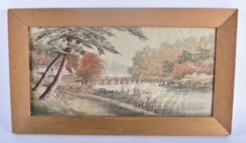 A 19TH CENTURY JAPANESE MEIJI PERIOD EMBROIDERED SILK PANEL depicting a river landscape. 42 cm x