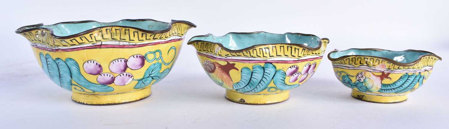 AN UNUSUAL SET OF THREE 19TH CENTURY CHINESE CANTON ENAMEL BOWLS Qing. Largest 13 cm wide. (3) - Image 2 of 4