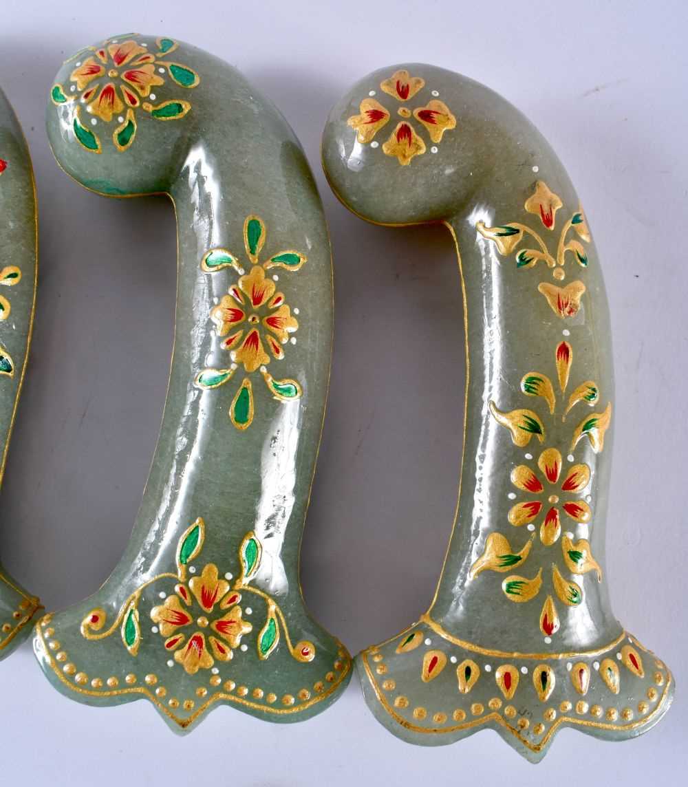 A SET OF FIVE MIDDLE EASTERN QAJAR LACQUER HARDSTONE DAGGER HANDLES overlaid with foliage and vines. - Image 4 of 6