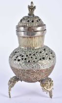A 19TH CENTURY TIBETAN WHITE METAL AND COPPER INCENSE BURNER AND COVER decorated with foliage. 20 cm