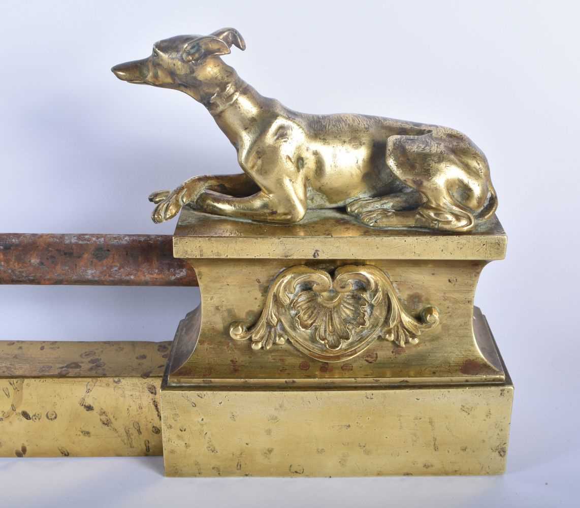 A LOVELY REGENCY COUNTRY HOUSE ORMOLU AND STEEL GREYHOUND FENDER formed with two recumbent hounds. - Image 3 of 4