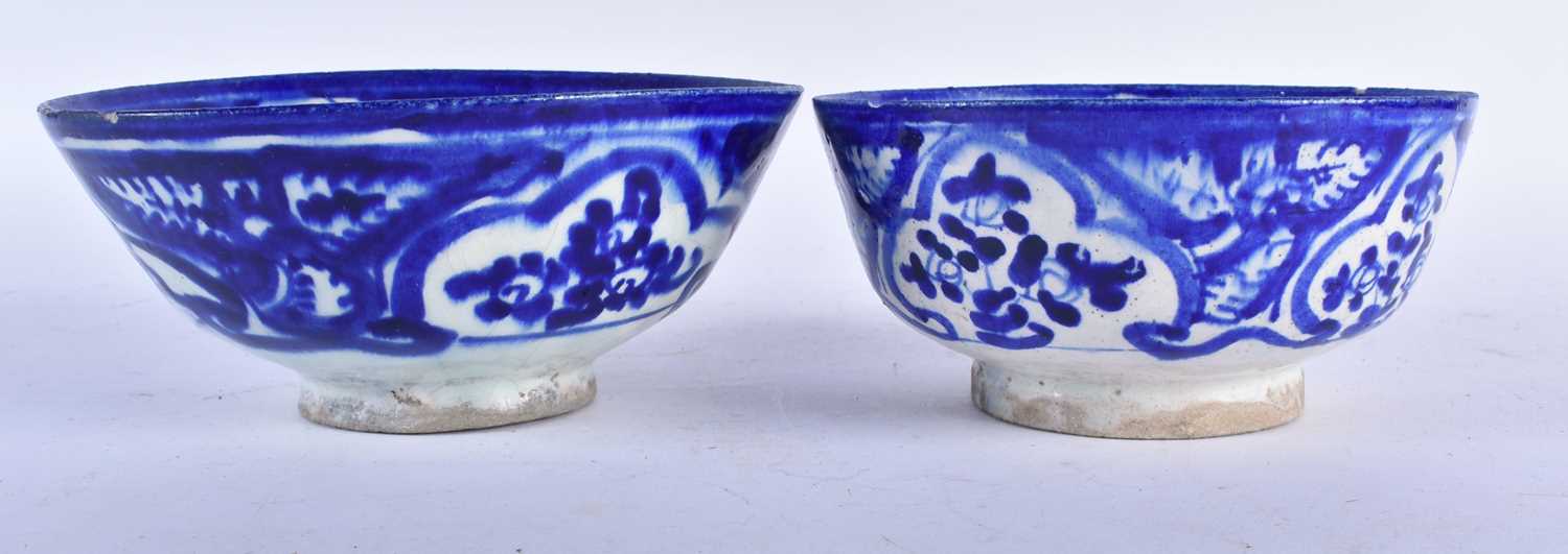 TWO ANTIQUE PERSIAN SAFAVID BLUE AND WHITE POTTERY BOWLS. Largest 18cm wide. (2) - Image 2 of 4