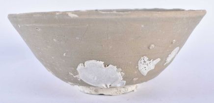 AN EARLY CHINESE CELADON INCISED SHIPWRECK BOWL King, overlaid with coral crustaceans. 17 cm