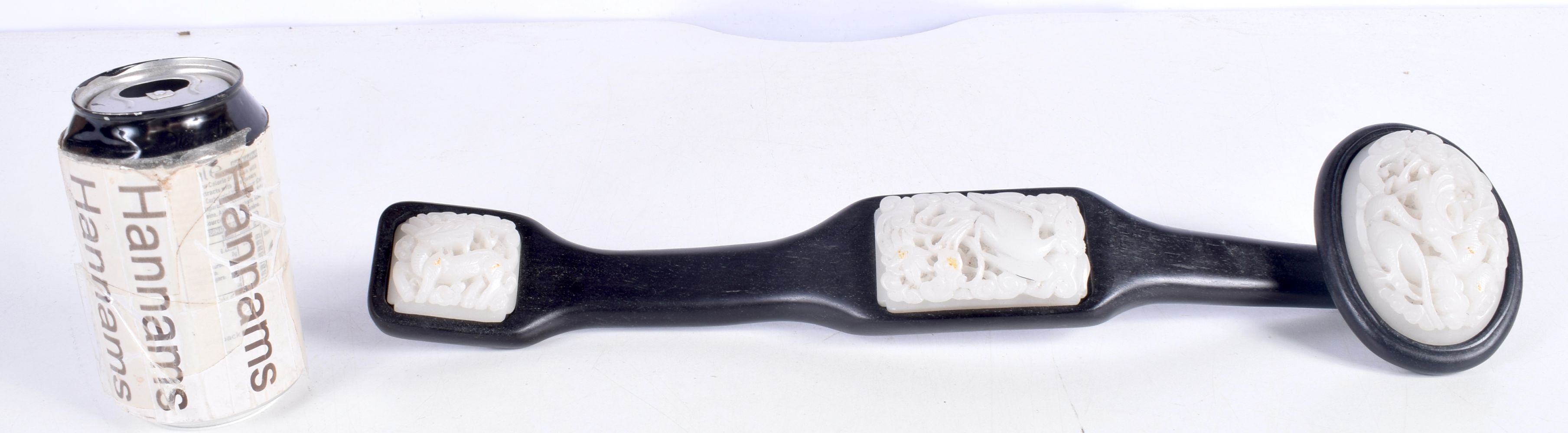 A hardwood and carved jade Rui sceptre 42 x 5.5 cm.