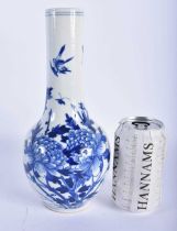 A 19TH CENTURY CHINESE BLUE AND WHITE PORCELAIN BULBOUS VASE painted with birds and flowers. 25cm