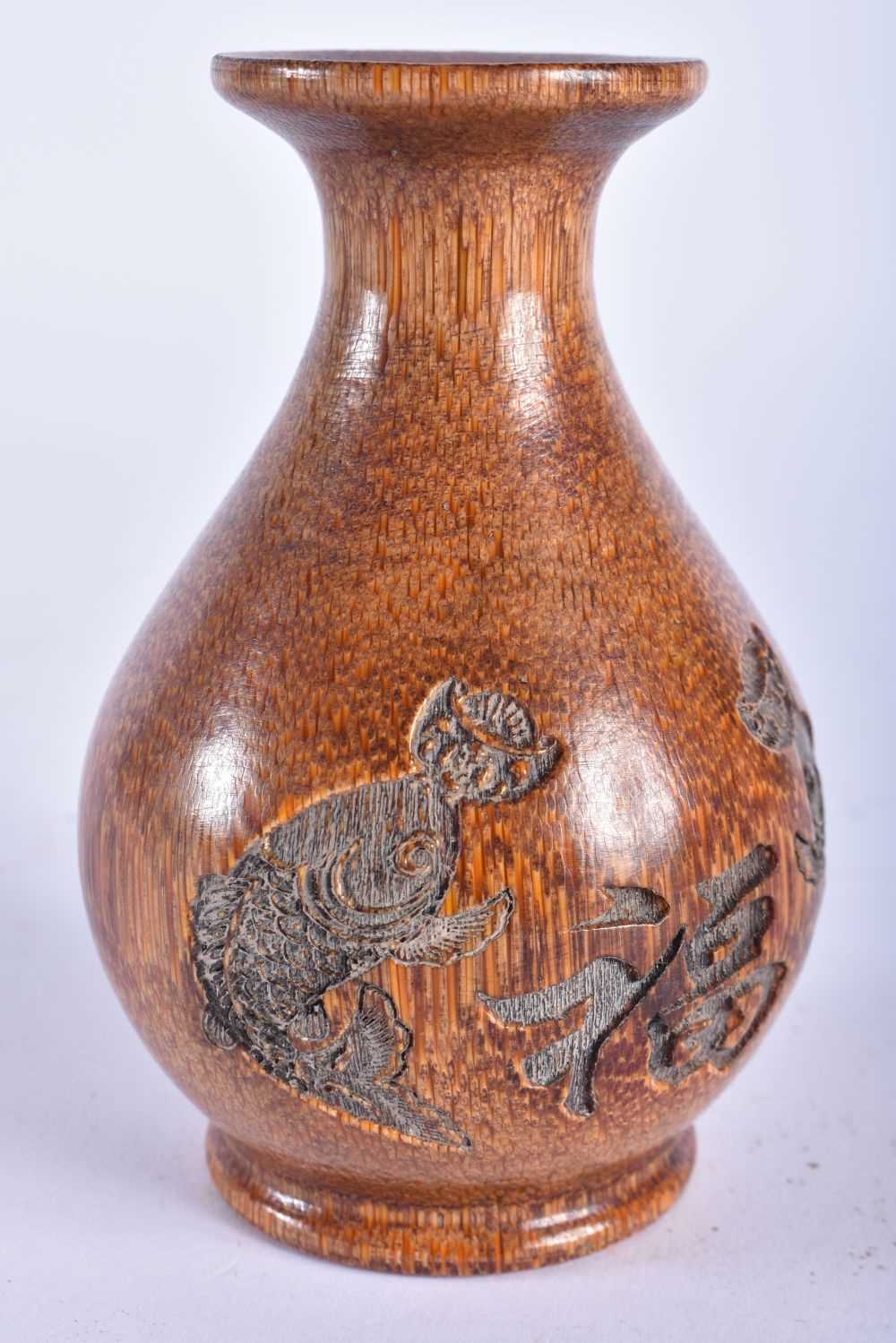 A CHINESE CARVED BUFFALO HORN TYPE YUHUCHUMPING VASE 20th Century. 243 grams. 11cm x 7 cm.