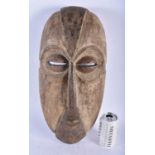 A LARGE AFRICAN TRIBAL CARVED WOOD MASK. 45cm x 20 cm.