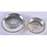 Two Silver Coin Dishes. 1 Stamped Silver. Largest 8.7cm x 1cm, total weight 60.9g (2)