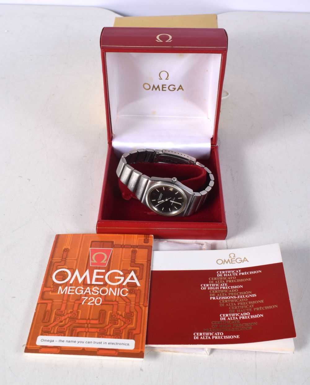 A Boxed Omega Megasonic 720 Constellation Steel Cal 1220 Watch with papers. 3.8 cm incl crown,