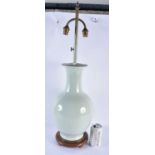 A LARGE EARLY 20TH CENTURY CHINESE CELADON INCISED COUNTRY HOUSE LAMP. 68 cm high.