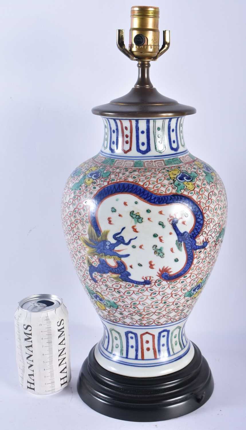 A LARGE LATE 19TH/20TH CENTURY CHINESE WUCAI PORCELAIN DRAGON LAMP Late Qing. 45cm high.