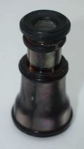 AN ANTIQUE MOTHER OF PEARL MONOCULAR. 54 grams. 7 cm x 3.75 cm.