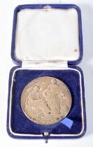 A Royal Horticultural Society Bronze Medal in a fitted case , presented in 1928. 4.4cm diameter