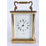 A OCLEE & SON CARRIAGE CLOCK. 17 cm high inc handle.