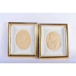 A PAIR OF 19TH CENTURY PLASTER COUNTY HOUSE CLASSICAL PORTRAIT PANELS within giltwood frames. 24