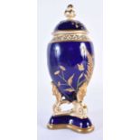 Graingers Worcester vase and cover with cobalt blue ground decorated with raised gilt ferns. 22cm