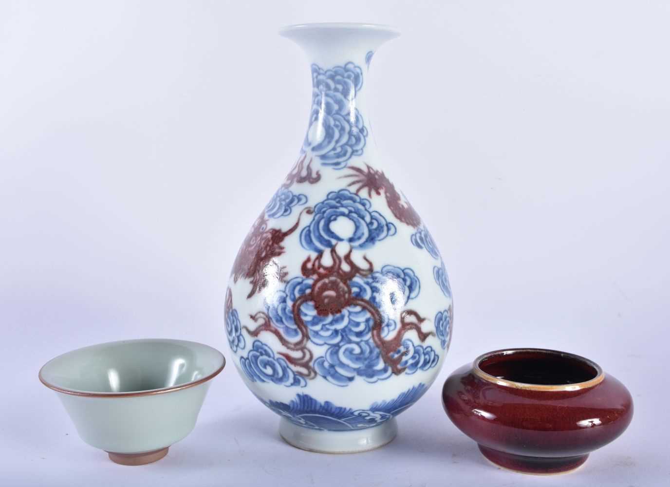 A CHINESE IRON RED BLUE AND WHITE PORCELAIN DRAGON VASE 20th Century, together with a bowl & brush - Image 2 of 6