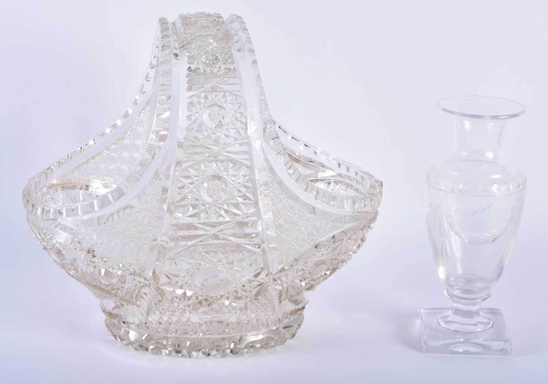 A FINE ANTIQUE CUT GLASS BASKET together with an antique English neo classical glass vase. Largest